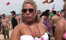 Raunchy babes get crazy at the beach