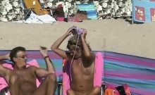 Shaved and hairy amateur pussies on hidden cam beach
