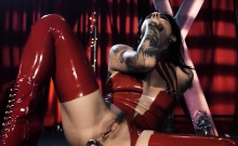 Lusty tattooed Joanna Angel masturbating in red latex