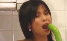 hairy and hot asian slut loves to play with some vegetables