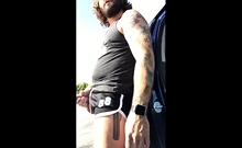 Bearded eats cum in public after he's playing with his dildo