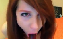 Pale Redhead deepthroats and masturbates to screaming orgasm