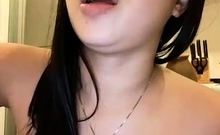 pretty thai woman masturbating with rubber chicken toy